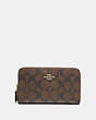 COACH®,MEDIUM ID ZIP WALLET IN SIGNATURE CANVAS,Mini,Gold/Brown Black,Front View