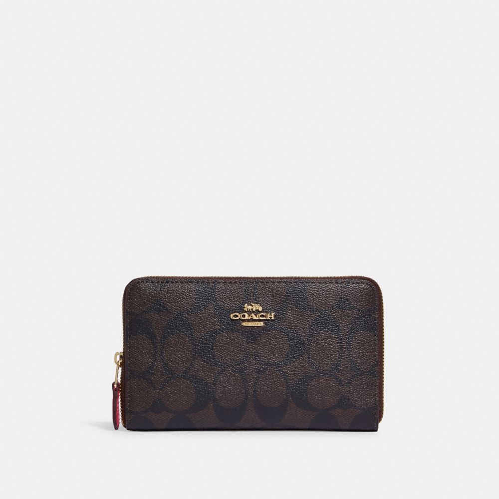 GOLD EMBOSSED ZIPPER WALLET – The Monogram Corner