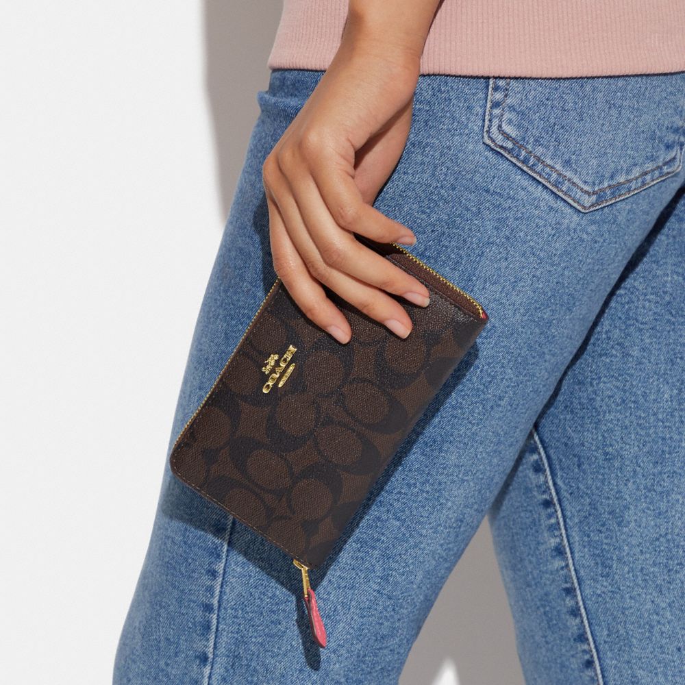 COACH® Outlet | Medium Id Zip Wallet In Signature Canvas