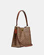 COACH®,CHARLIE BUCKET BAG IN SIGNATURE CANVAS,pvc,Medium,Brass/Tan/Rust,Angle View