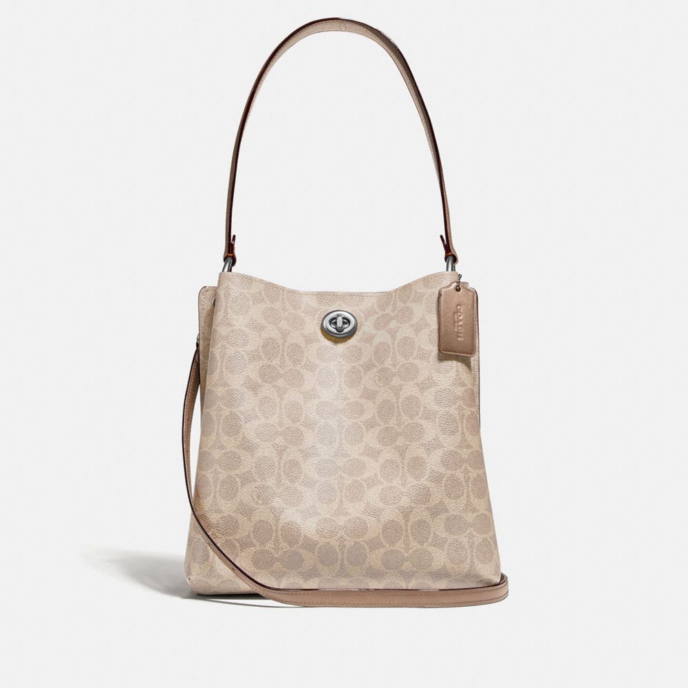 COACH®  Charlie Bucket Bag In Signature Canvas