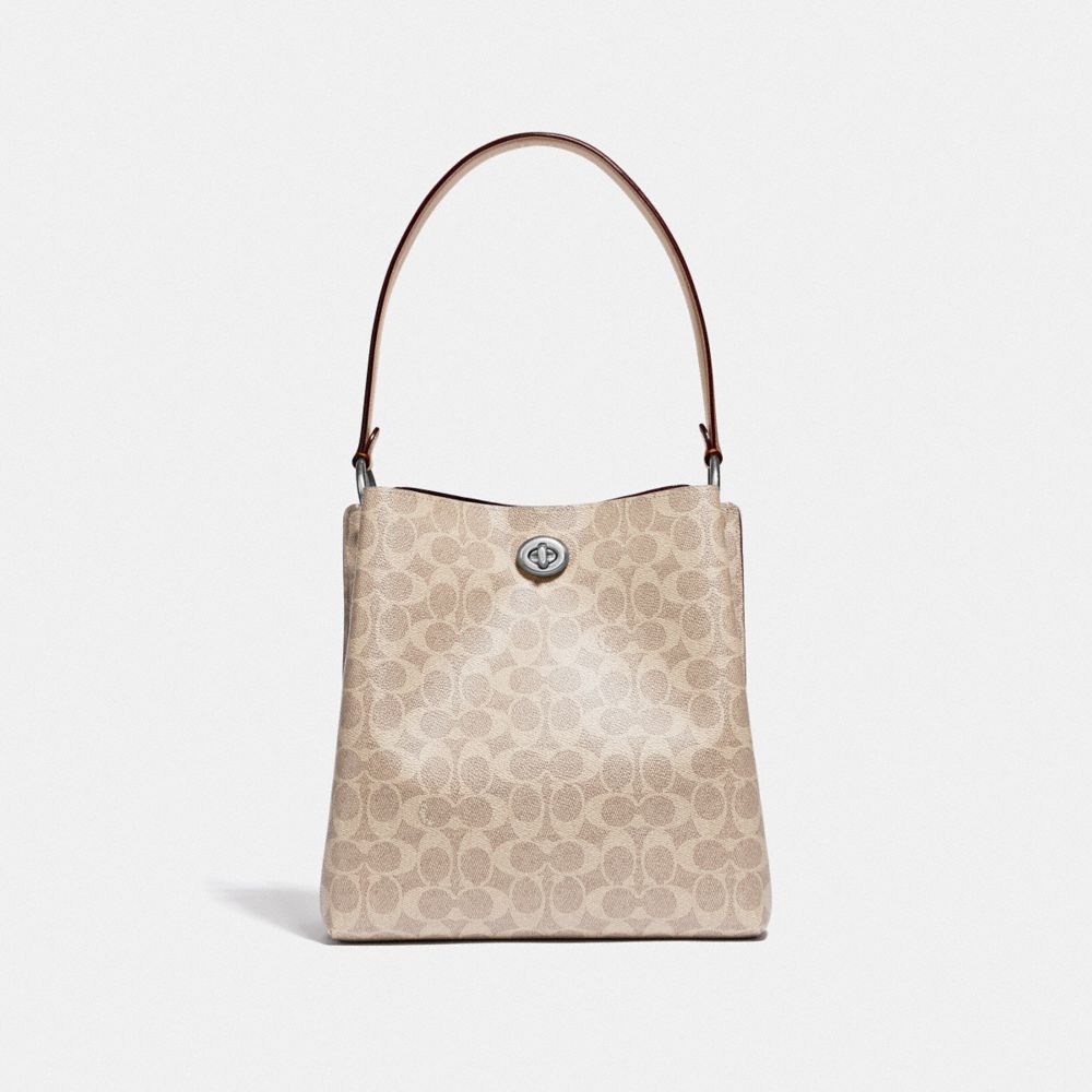 COACH®,Charlie Bucket Bag In Signature Canvas,,Back View