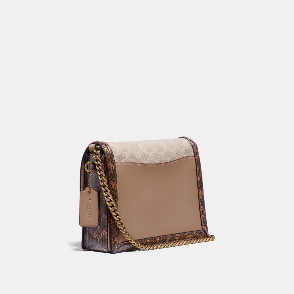 COACH®,HUTTON SHOULDER BAG IN BLOCKED SIGNATURE CANVAS WITH SNAKESKIN DETAIL,Signature Coated Canvas/Coated Canv...,Brass/Tan Sand,Angle View