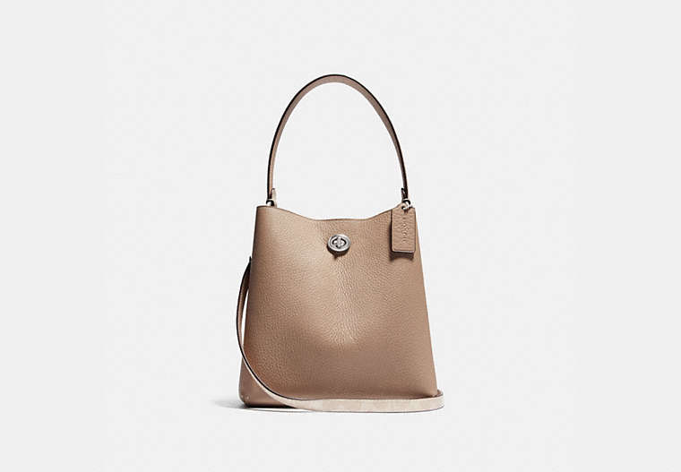 COACH®,CHARLIE BUCKET BAG 21 IN BLOCKED SIGNATURE CANVAS,Pebble Leather,Small,Light Antique Nickel/Sand Taupe,Front View