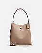 COACH®,CHARLIE BUCKET BAG 21 IN BLOCKED SIGNATURE CANVAS,Pebble Leather,Small,Light Antique Nickel/Sand Taupe,Front View