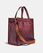 COACH®,FIELD TOTE WITH HORSE AND CARRIAGE PRINT,Coated Canvas,Medium,Brass/Oxblood Cranberry,Angle View