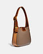 COACH®,COURIER HOBO IN COLORBLOCK,Smooth Leather,Medium,Brass/Light Saddle Elm,Angle View