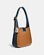 COACH®,COURIER HOBO IN COLORBLOCK,Smooth Leather,Medium,Brass/Light Saddle/Pine Green,Angle View