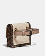 COACH®,HUTTON BELT BAG IN BLOCKED SIGNATURE CANVAS WITH SNAKESKIN DETAIL,Coated Canvas,Mini,Brass/Tan Sand,Angle View