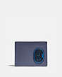 COACH®,SLIM BILLFOLD WALLET IN COLORBLOCK WITH COACH PATCH,n/a,Deep Sky/Blue Mist,Front View