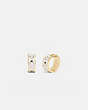 COACH®,KISSING SIGNATURE HUGGIE EARRINGS,Plated Brass/Enamel,GOLD/CHALK,Front View