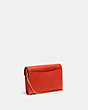 COACH®,TABBY CHAIN CLUTCH,Pebbled Leather,Mini,Brass/Red Orange,Angle View