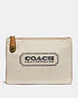 COACH®,TURNLOCK POUCH 26 WITH COACH BADGE,canvas,Brass/Canvas Light Saddle,Front View