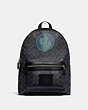 COACH®,ACADEMY BACKPACK IN SIGNATURE CANVAS BY ROBERT FRANK HUNTER,Coated Canvas,Large,Black Copper/Charcoal,Front View