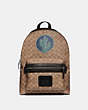 COACH®,ACADEMY BACKPACK IN SIGNATURE CANVAS BY ROBERT FRANK HUNTER,Coated Canvas,Large,Black Copper/Khaki,Front View