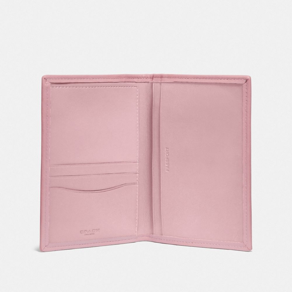 women coach passport holder