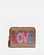 Small Zip Around Wallet In Signature Canvas With Love Print