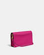 COACH®,HAYDEN FOLDOVER CROSSBODY CLUTCH BAG,Leather,Mini,Pewter/Cerise,Angle View