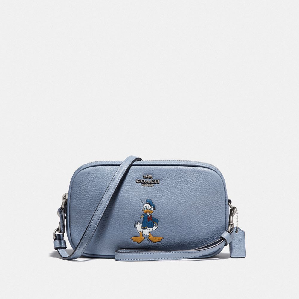 Pochette à bandoulière Disney X Coach Sadie avec motif Donald Duck