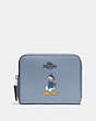 Disney X Coach Small Zip Around Wallet With Donald Duck Motif