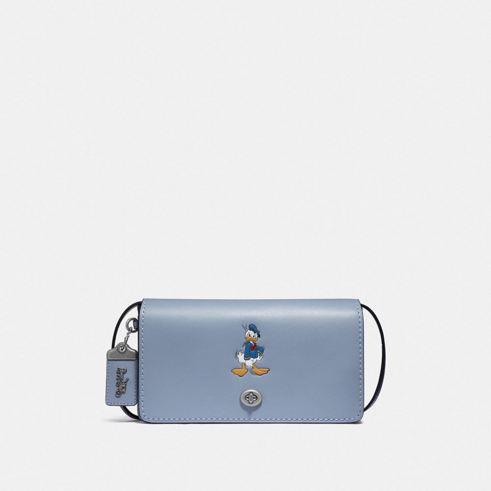 Disney x coach dinky sale