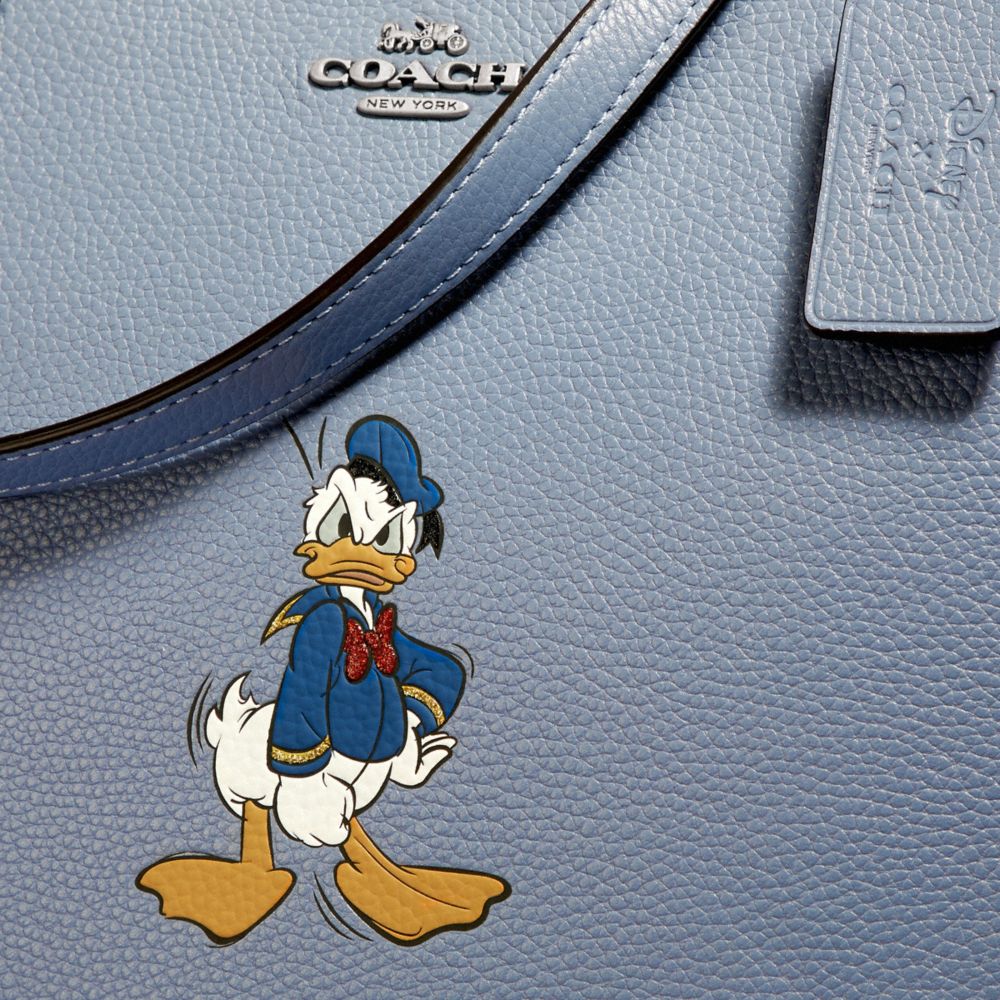 Donald duck coach bag new arrivals