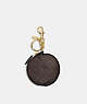 COACH®,CIRCULAR COIN POUCH BAG CHARM IN SIGNATURE CANVAS,pvc,Mini,Gold/Brown Black,Front View