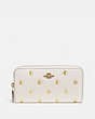 COACH®,ACCORDION ZIP WALLET WITH APPLE PRINT,Leather,Mini,Brass/Chalk Multi,Front View