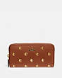 COACH®,ACCORDION ZIP WALLET WITH APPLE PRINT,Leather,Mini,Brass/Saddle Multi,Front View