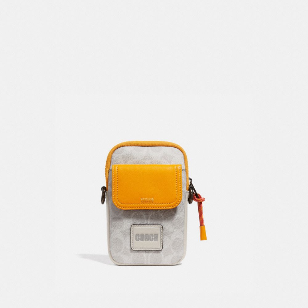 Pochette convertible Pacer en toile signature color block avec écusson Coach