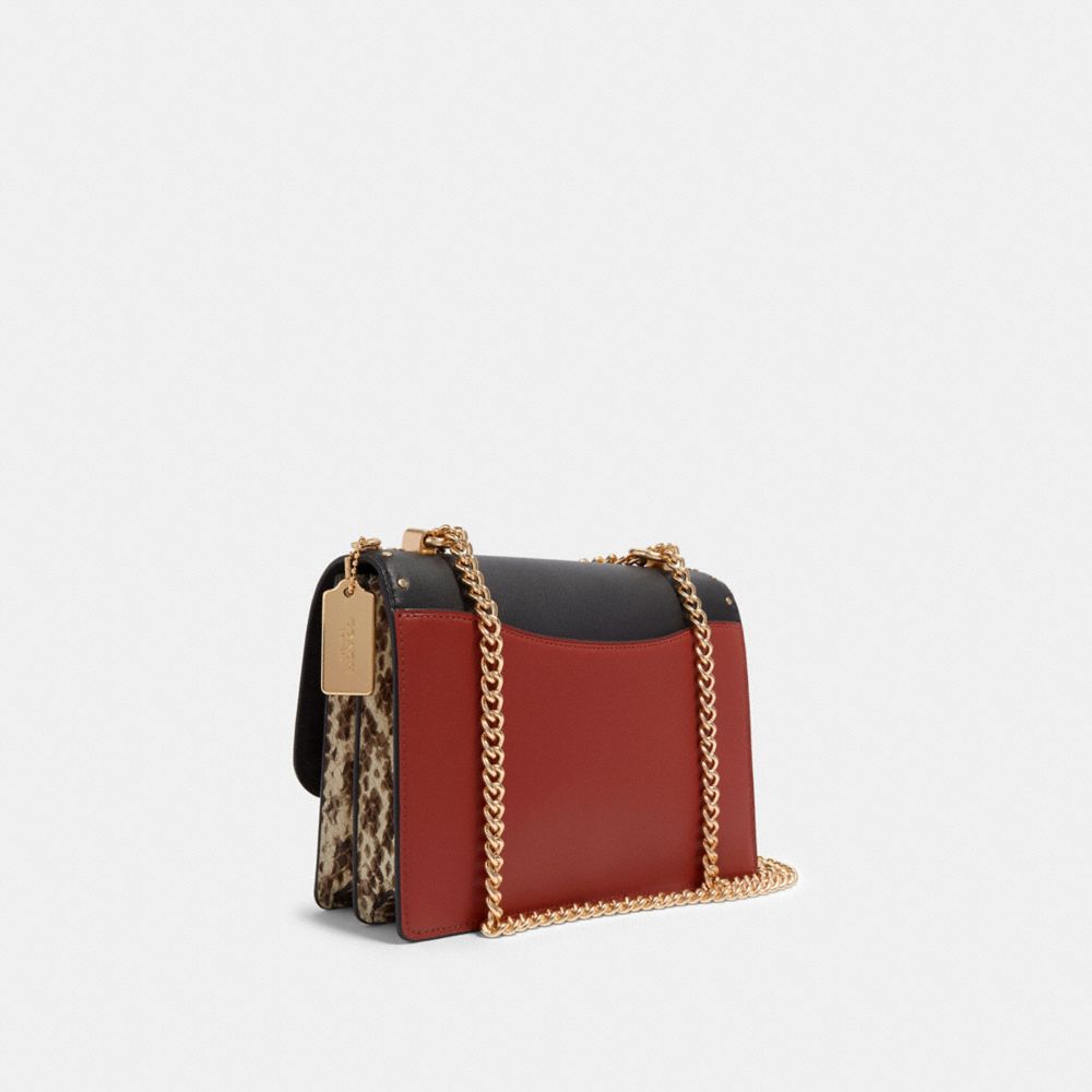 COACH®,Klare Crossbody Bag In Signature Canvas With Rivets,Leather,Canvas,Crossbody,PVC,Color Block,Logo,Studded,Mixed Med...,Multi Color,Angle View