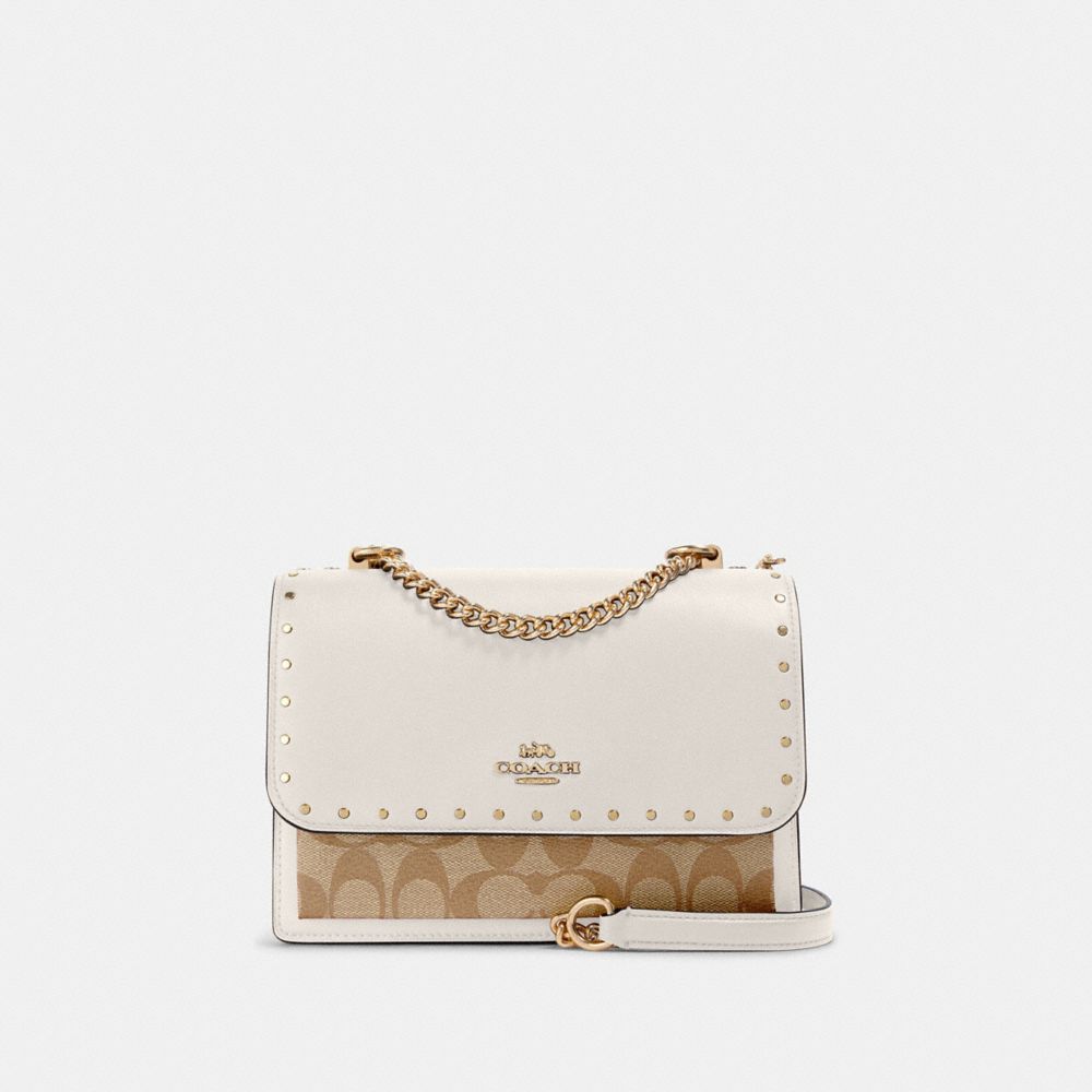 COACH®,KLARE CROSSBODY BAG IN SIGNATURE CANVAS WITH RIVETS,Signature Canvas,Medium,Anniversary,Gold/Light Khaki Multi,Front View