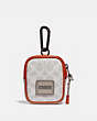 COACH®,HYBRID POUCH 8 IN SIGNATURE CANVAS WITH COACH PATCH,Signature Coated Canvas/Smooth Leather,Mini,Chalk/Mango,Front View