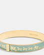 COACH®,HORSE AND CARRIAGE ENAMEL BANGLE,Plated Brass,Gold/Blue,Front View
