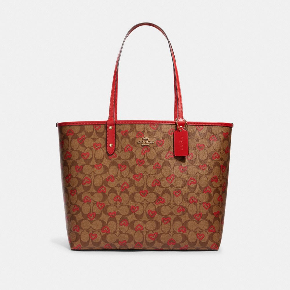 COACH Outlet Reversible City Tote In Signature Canvas With Crayon Hearts Print