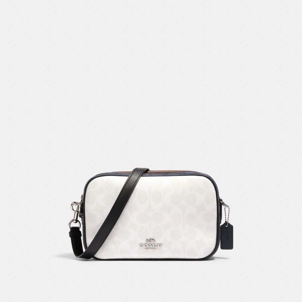 Jes crossbody in blocked signature canvas sale