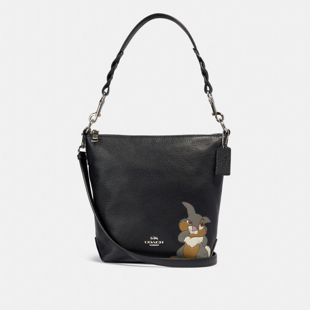 Disney x coach clearance camera bag with thumper