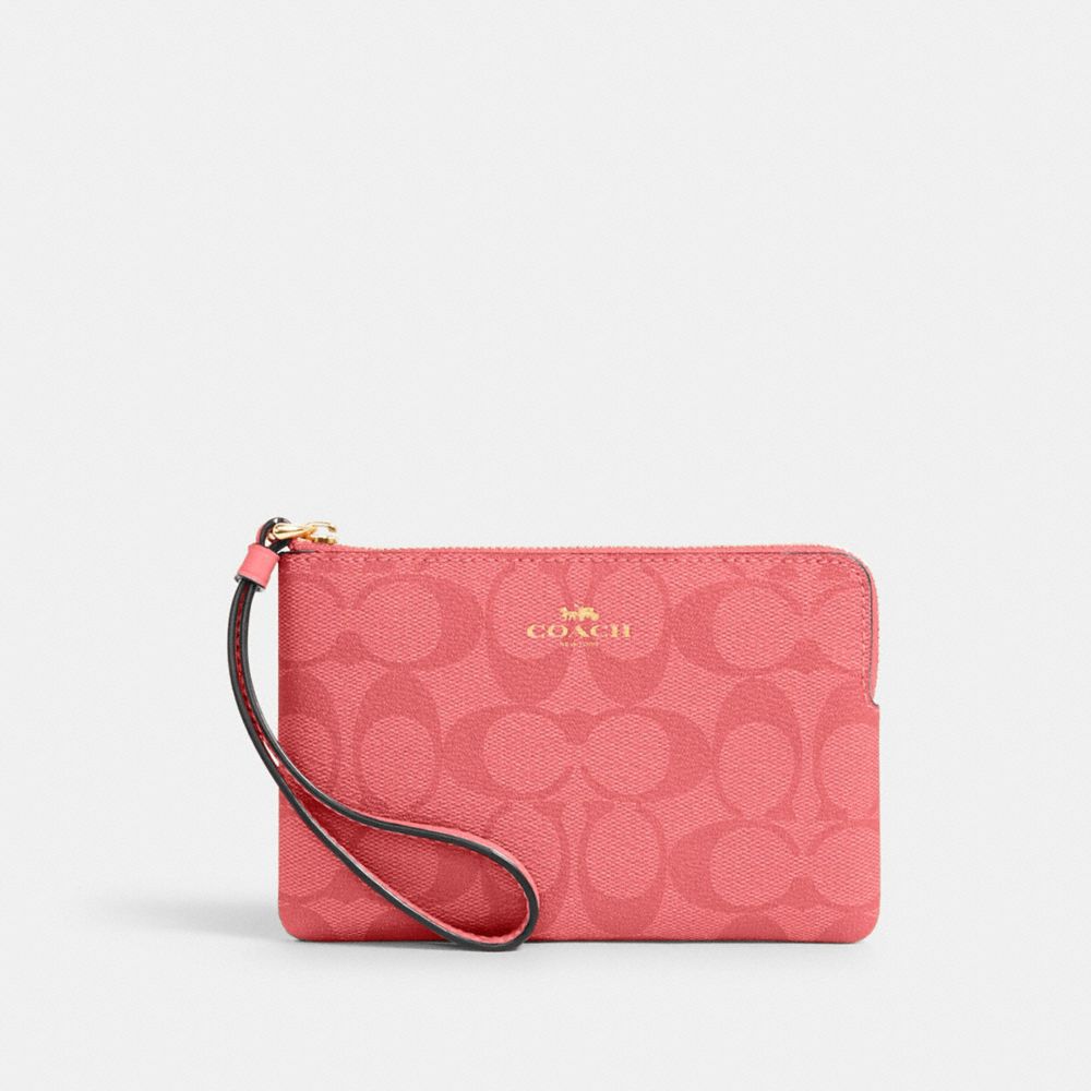 COACH Waverly Signature Small Wristlet in Pink