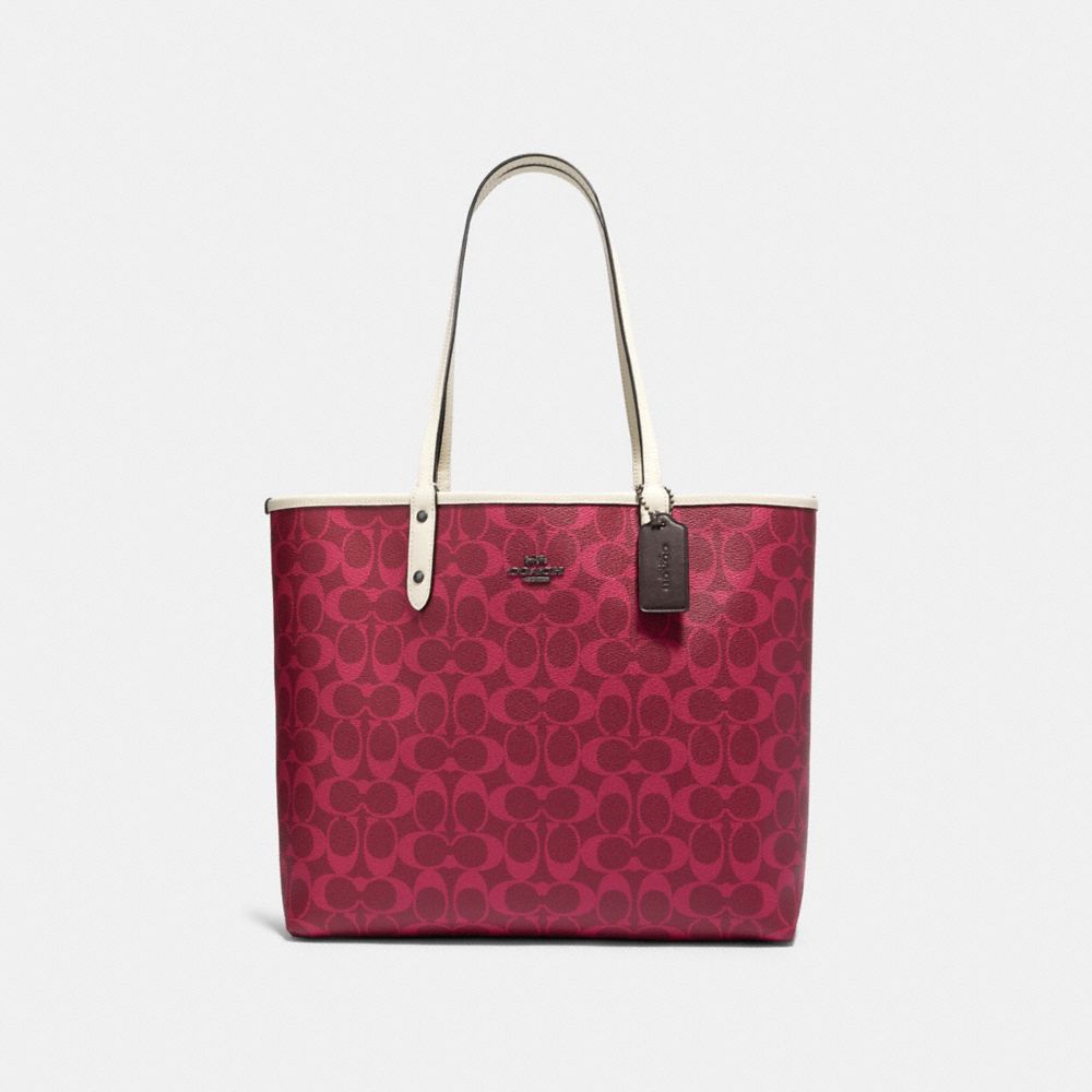 COACH®,Reversible City Tote In Blocked Signature Canvas,,Angle View