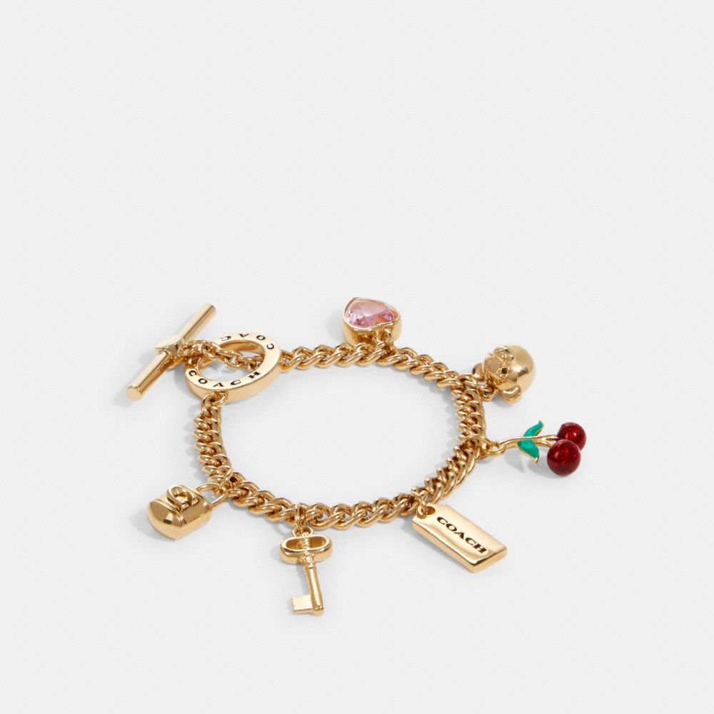 Bracelet avec breloque Coach