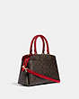 COACH®,MINI LILLIE CARRYALL IN SIGNATURE CANVAS,pvc,Large,Gold/Brown 1941 Red,Angle View