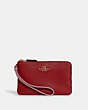 COACH®,DOUBLE CORNER ZIP WRISTLET IN COLORBLOCK,Leather,Small,Gold/1941 Red Multi,Front View