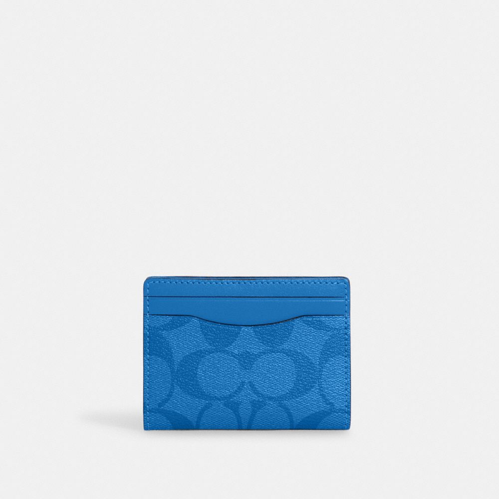 COACH®,MAGNETIC CARD CASE IN SIGNATURE CANVAS,Signature Canvas,Gunmetal/Bright Blue,Front View image number 0