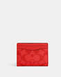 COACH®,MAGNETIC CARD CASE IN SIGNATURE CANVAS,pvc,Gunmetal/Miami Red,Front View