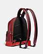 COACH®,SMALL ACADEMY BACKPACK WITH MYTHICAL MONSTER CHAMP,Leather,Medium,Lake Champlain Monster,Angle View
