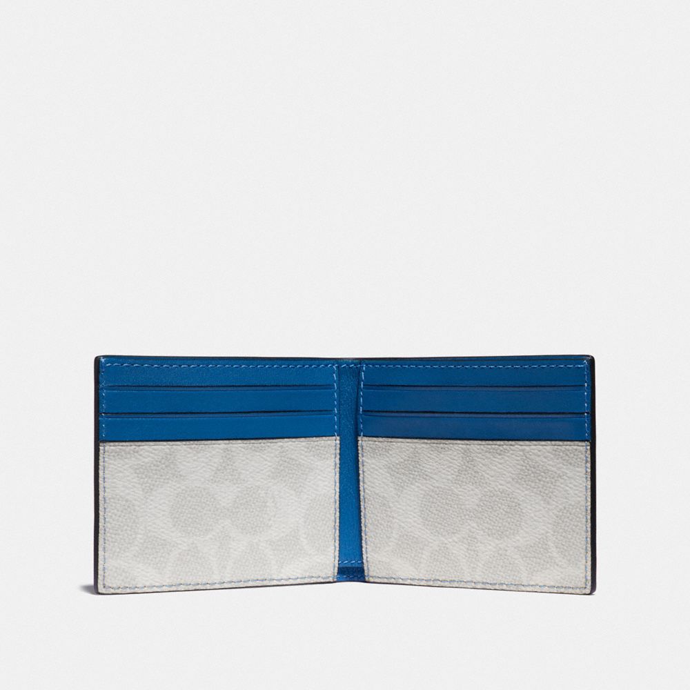 Coach slim billfold best sale wallet in signature canvas