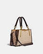 COACH®,DREAMER IN BLOCKED SIGNATURE CANVAS WITH SNAKESKIN DETAIL,Signature Coated Canvas/Smooth Leather/Exotic,M...,Brass/Tan Sand,Angle View