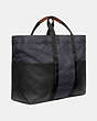 COACH®,REVERSIBLE PACER TOTE IN SIGNATURE CORDURA® FABRIC WITH COACH PATCH,n/a,X-Large,Black Copper/Blue Multi,Angle View