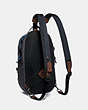 COACH®,REVERSIBLE PACER BACKPACK IN SIGNATURE CORDURA® FABRIC WITH COACH PATCH,n/a,Black Copper/Blue Multi,Angle View