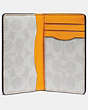 COACH®,CARD WALLET WITH SIGNATURE CANVAS INTERIOR,Leather,Pollen/Chalk,Inside View,Top View